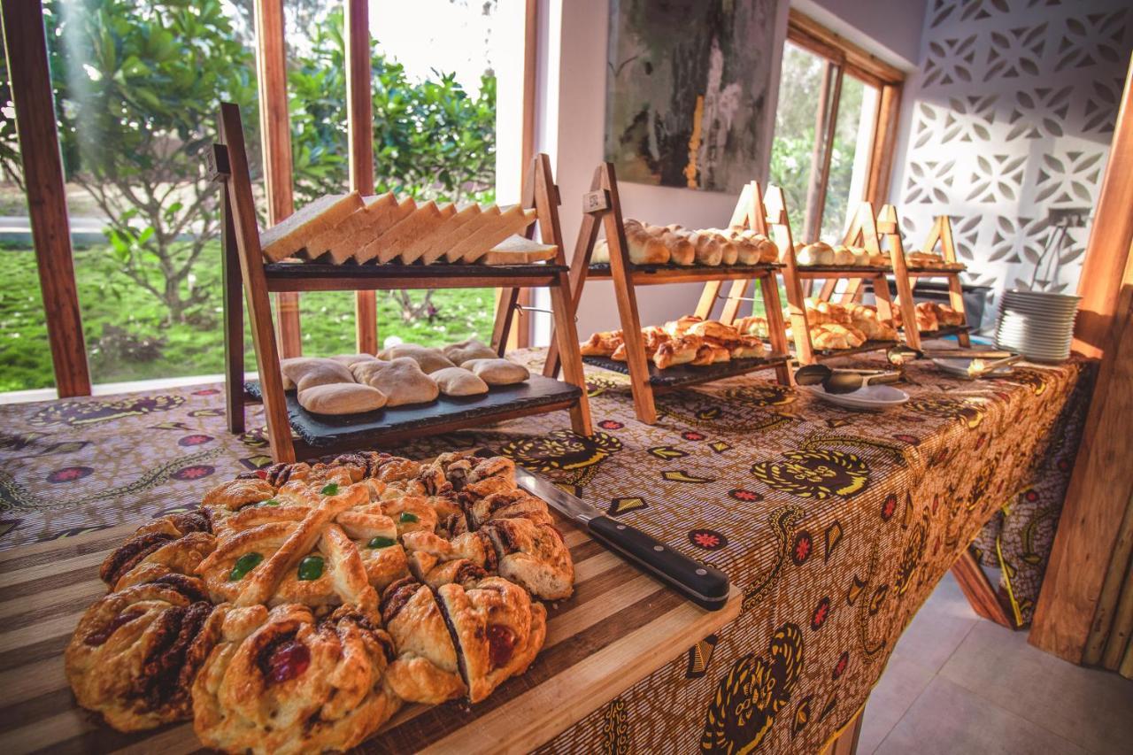 Zanzibella Hotel & Spa Kiwengwa  Exterior foto A selection of pastries at a buffet